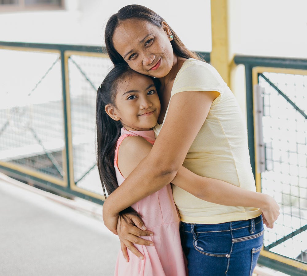 Angel and Joy hugging
